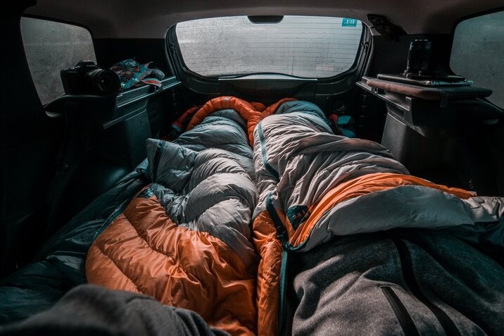 two-gray-orange-sleeping-bags